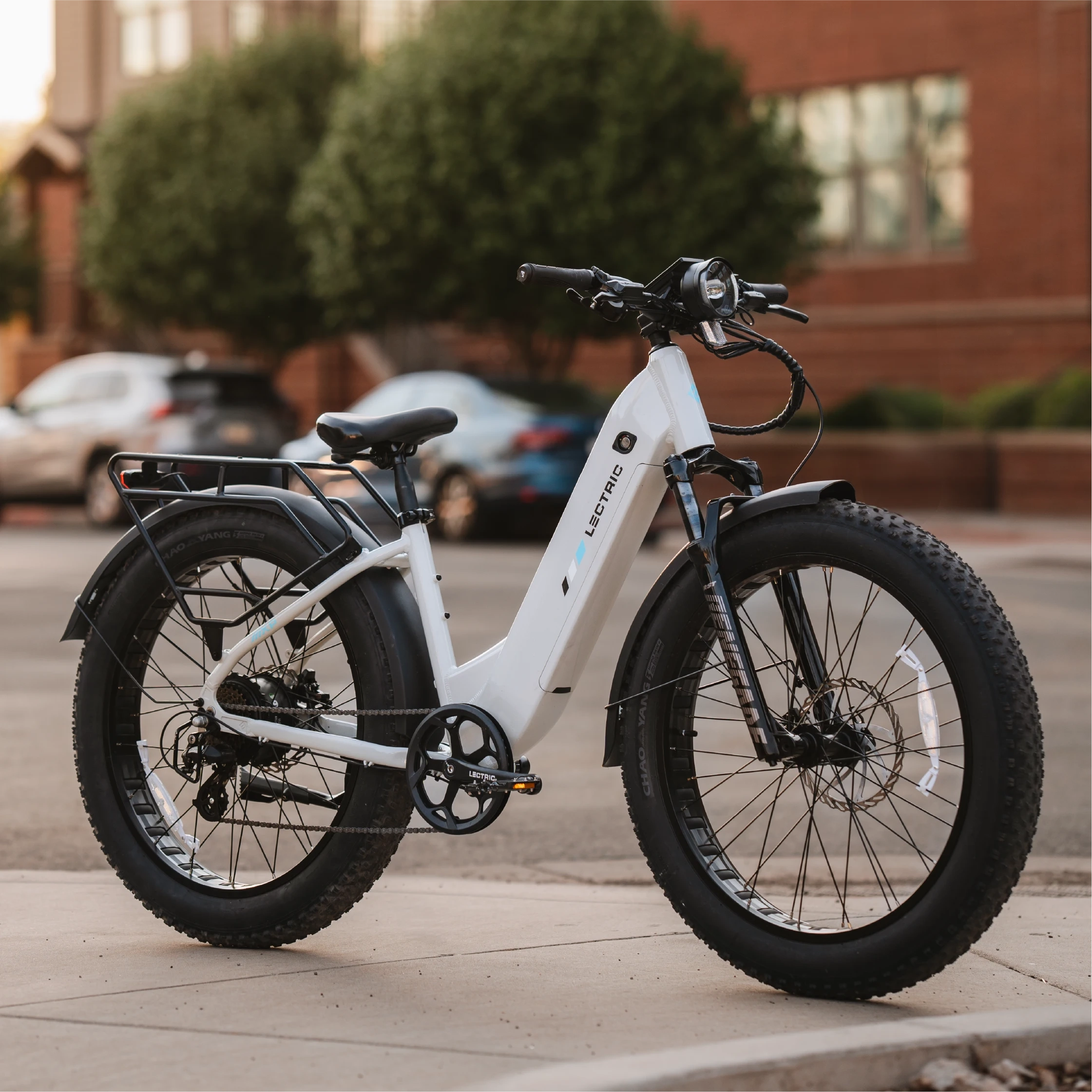 XPeak Step-Thru 2.0   FREE Rear Rack, Fenders, Elite Headlight, Suspension Seat Post ($316 Value)