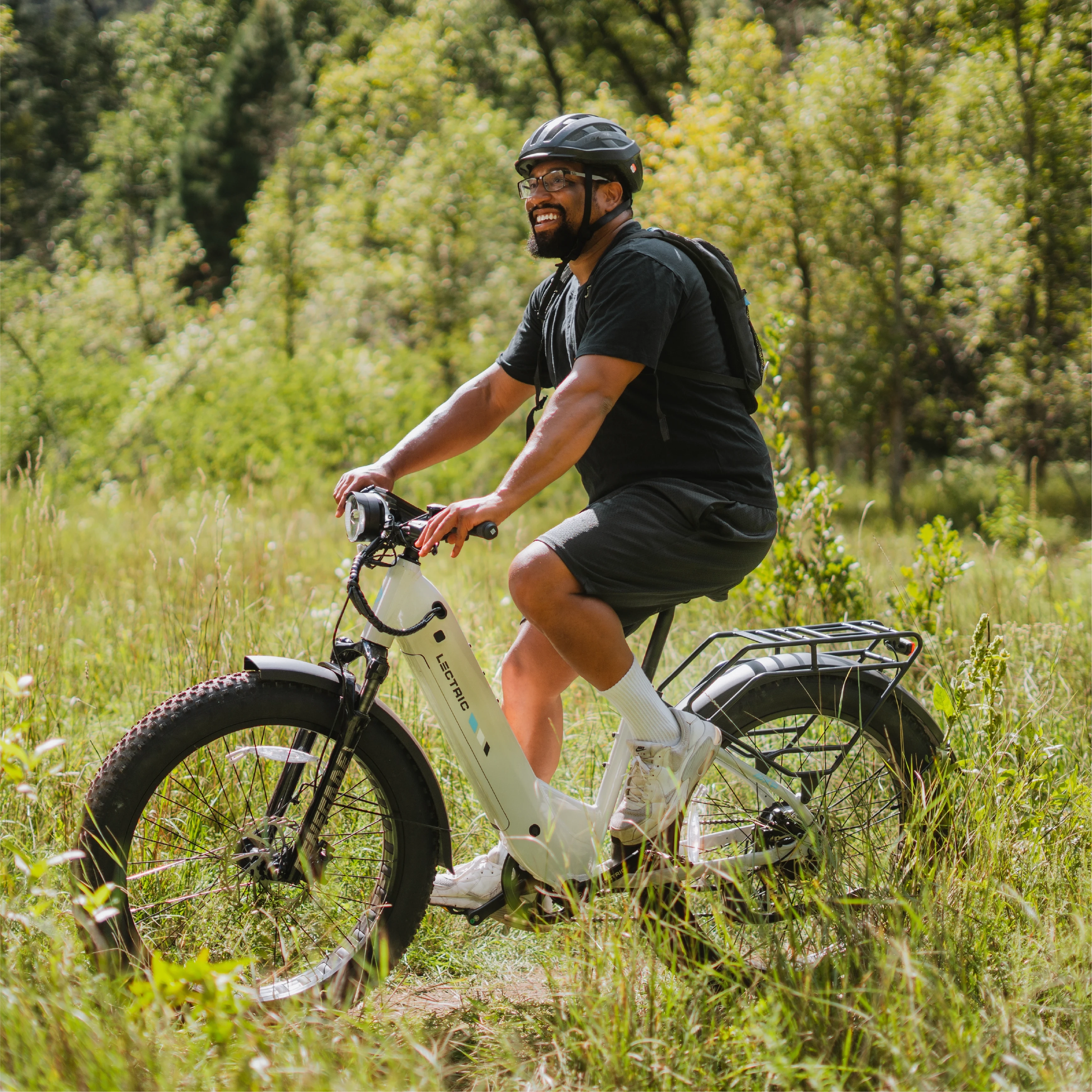 XPeak Step-Thru 2.0   FREE Rear Rack, Fenders, Elite Headlight, Suspension Seat Post ($316 Value)